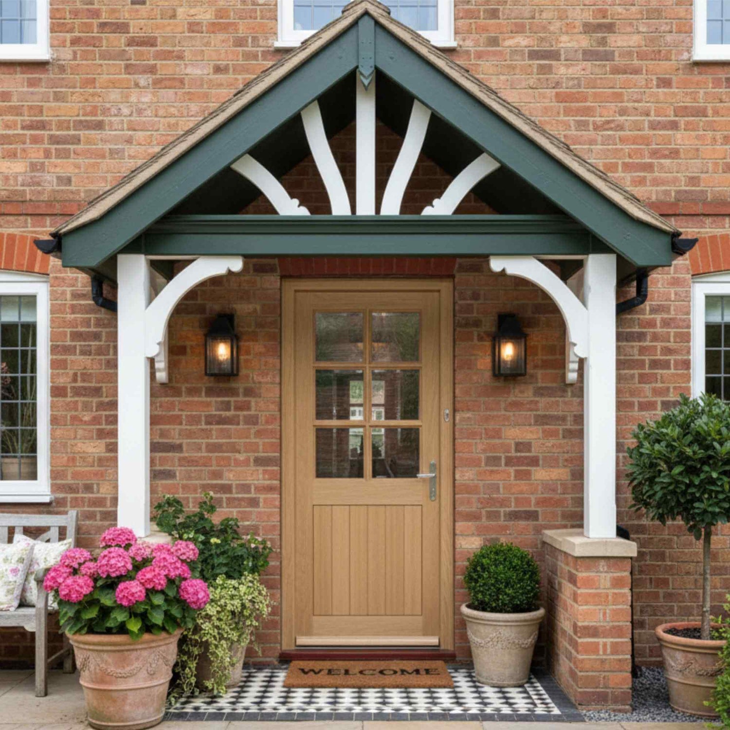 Front door of a house with a porch and decorative elements