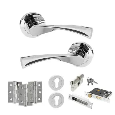 Product Set of silver door handles, hinges, and lock mechanism on a white background