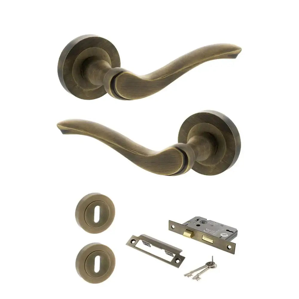 Product Warwick lever on round rose, matt antique brass finish