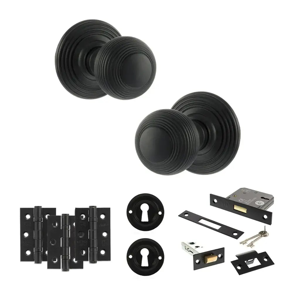 Pair of Ripon reeded beehive knobs in matt black with hinges, sash lock and keys