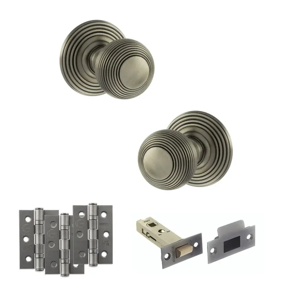 Pair of Ripon reeded beehive knobs in matt gunmetal with hinges and tubular latch