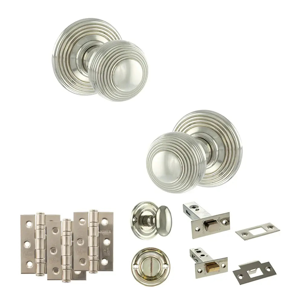 Pair of Ripon reeded beehive knobs in polished nickel with hinges, thumbturn and bathroom deadbolt