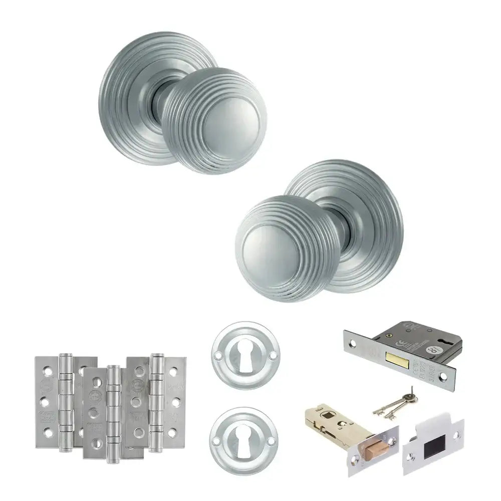 Pair of Ripon reeded beehive knobs in satin chrome with hinges, sash lock and keys