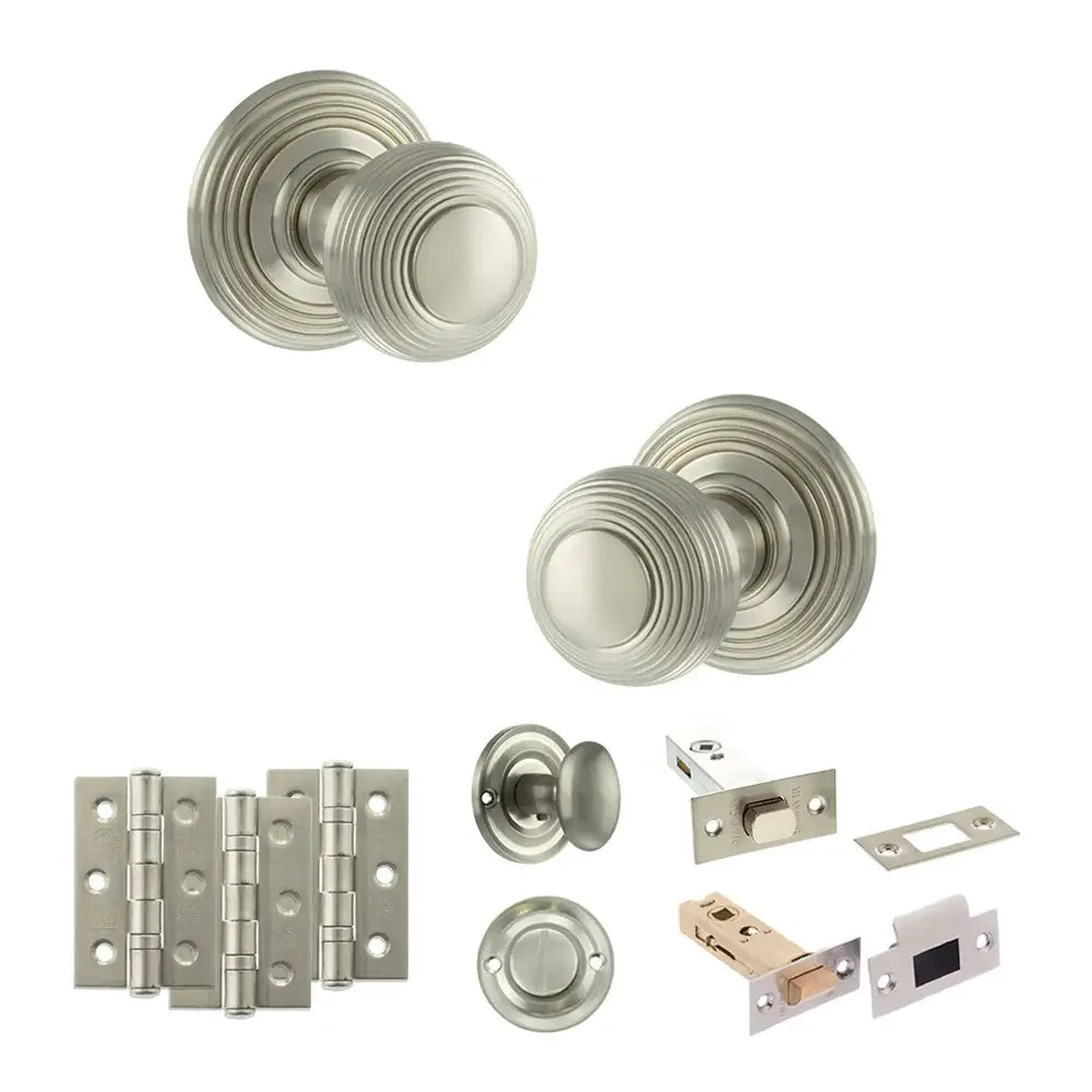 Pair of Ripon reeded beehive knobs in satin nickel with hinges, thumbturn and bathroom deadbolt