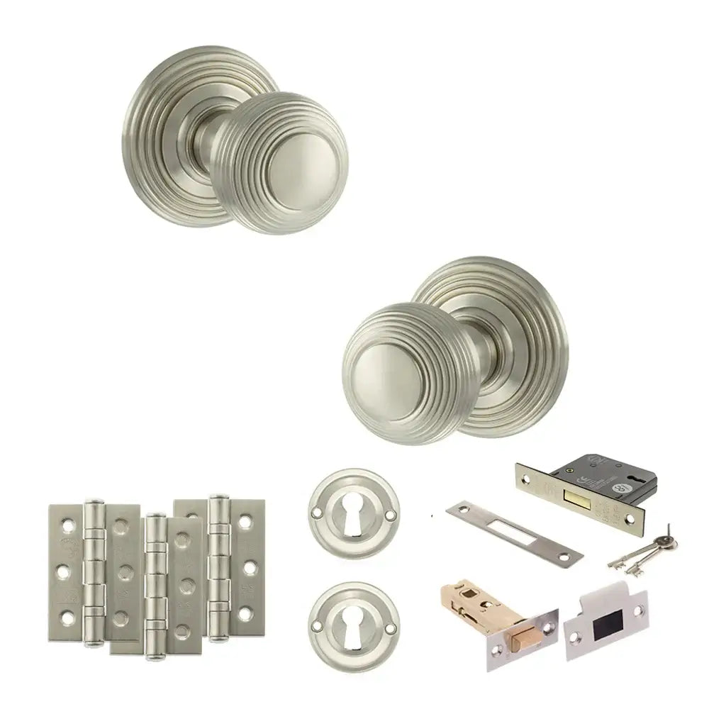 Pair of Ripon reeded beehive knobs in satin nickel with hinges, sash lock and keys
