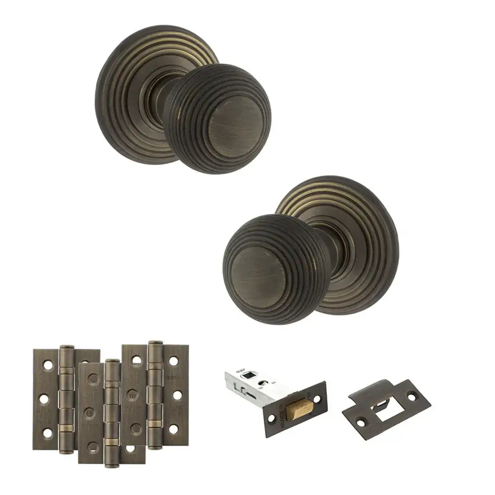 Pair of Ripon reeded beehive knobs in urban bronze with hinges and tubular latch