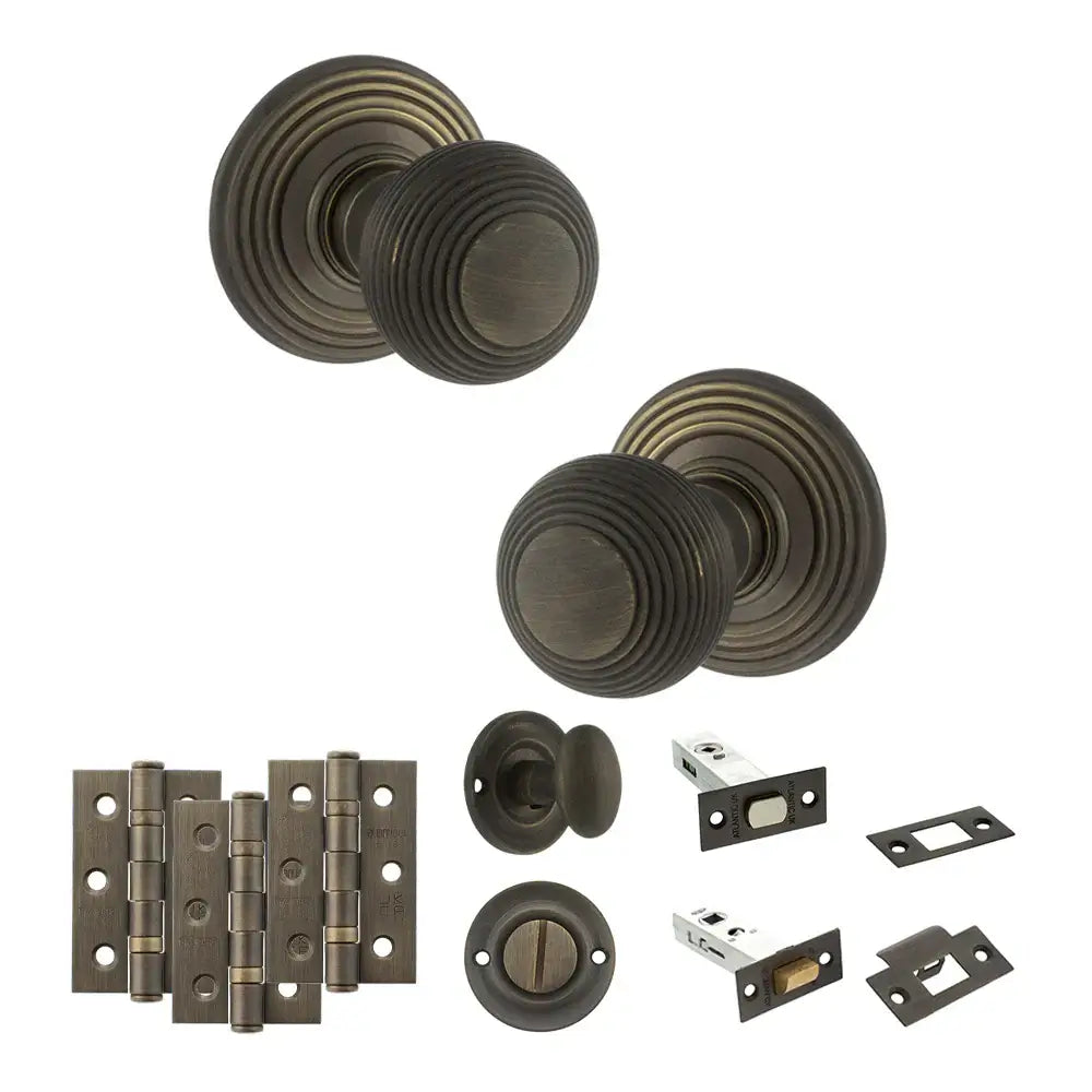 Pair of Ripon reeded beehive knobs in urban bronze with hinges, thumbturn and bathroom deadbolt