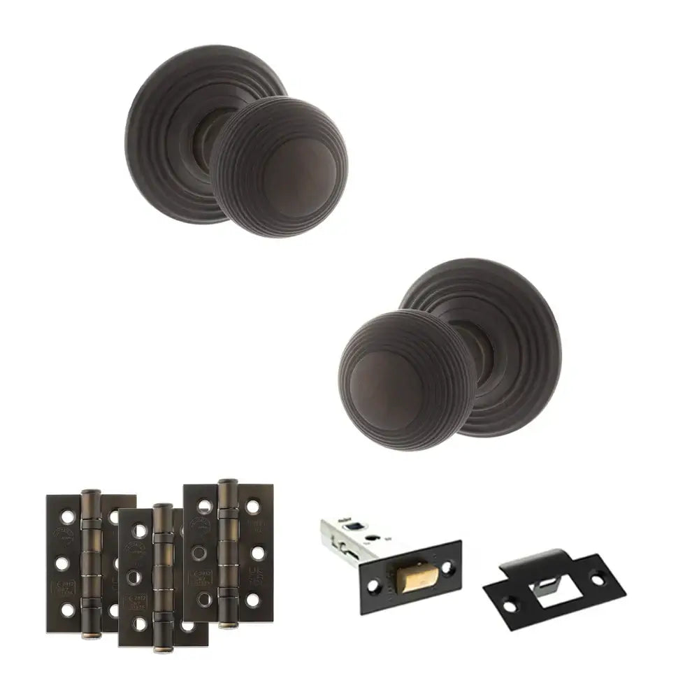 Pair of Ripon reeded beehive knobs in dark urban bronze with hinges and latch