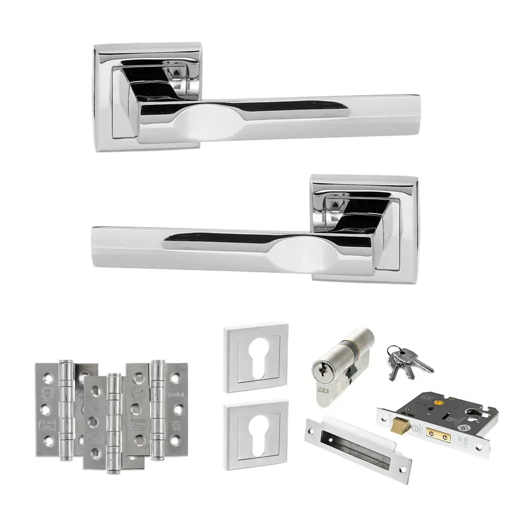 Product Set of chrome door handles, locks, and hinges on a white background