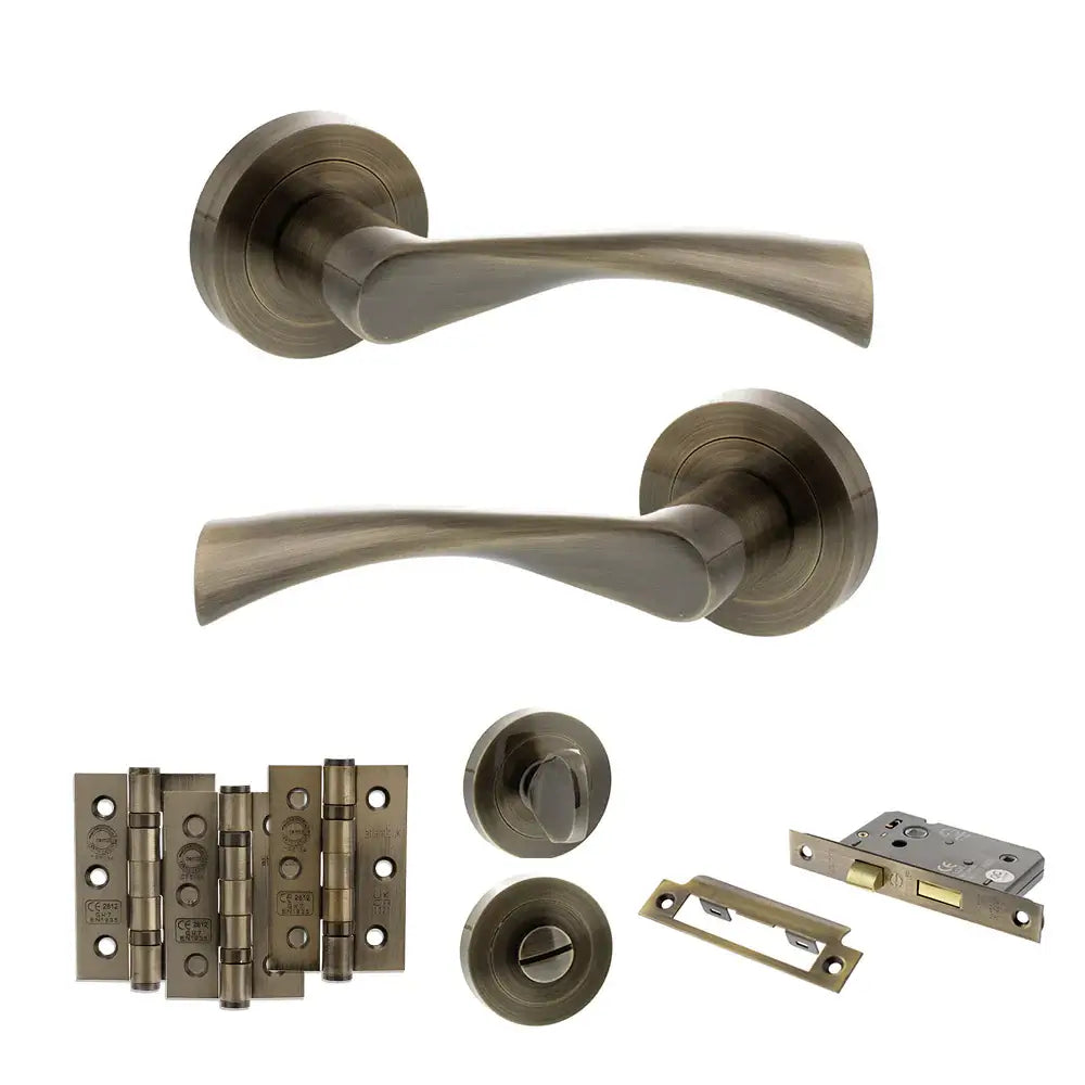 Product Set of bronze door handles and hardware components on a white background