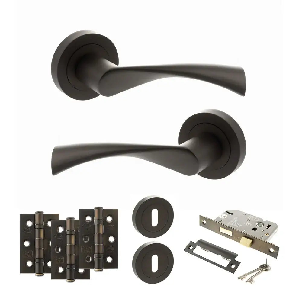 Product Set of black door handles, hinges, and lock mechanism on a white background