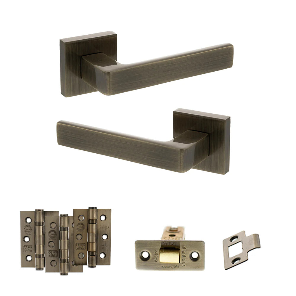 Product Set of bronze door handles and hardware components on a white background