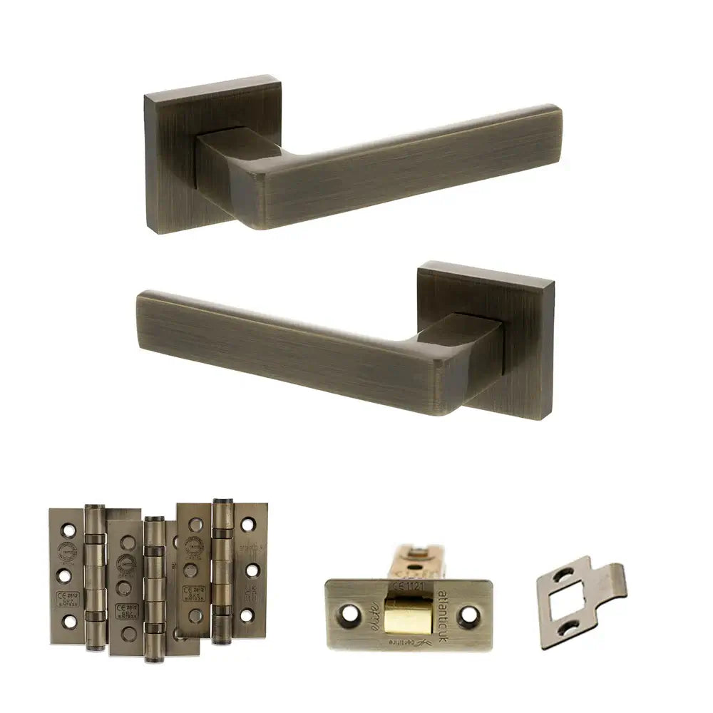 Product Set of bronze door handles and hardware components on a white background