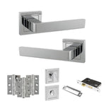 Product Set of polished chrome door handles and lock mechanism on a white background