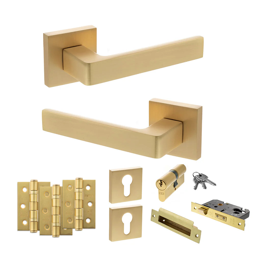 Product Gold door handle set with lock mechanism on a white background