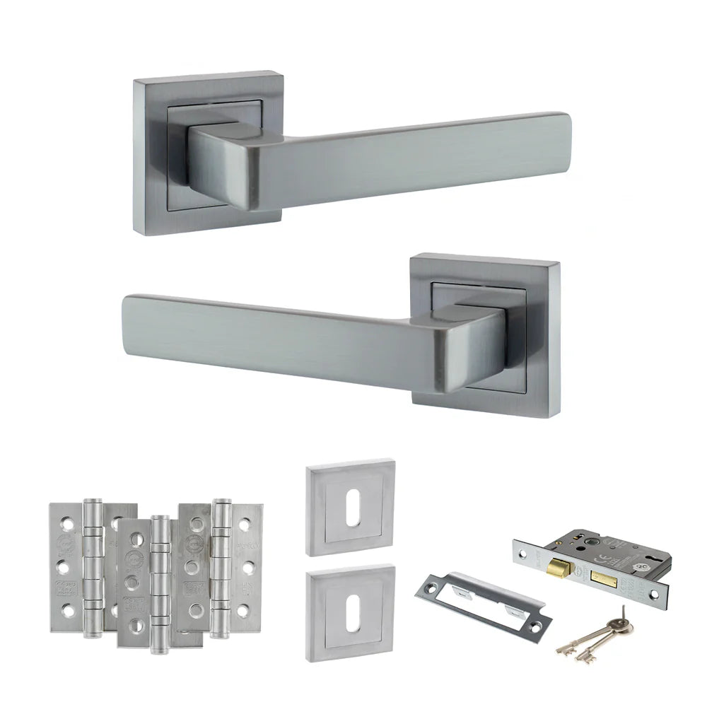 Product Set of stainless steel door handles and lock components on a white background