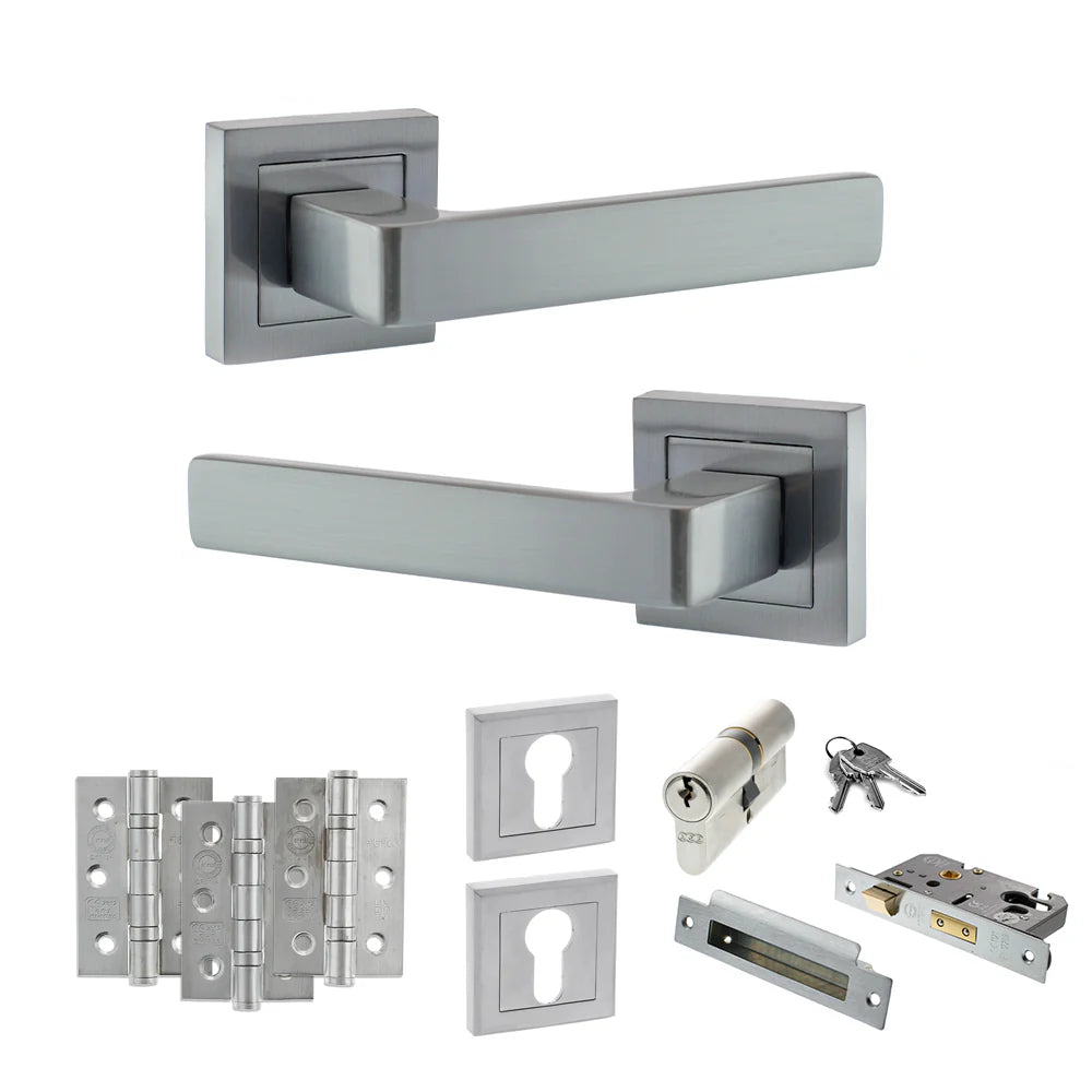 Product Set of stainless steel door handles and lock components on a white background