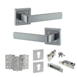 Product Set of stainless steel door handles and lock components on a white background