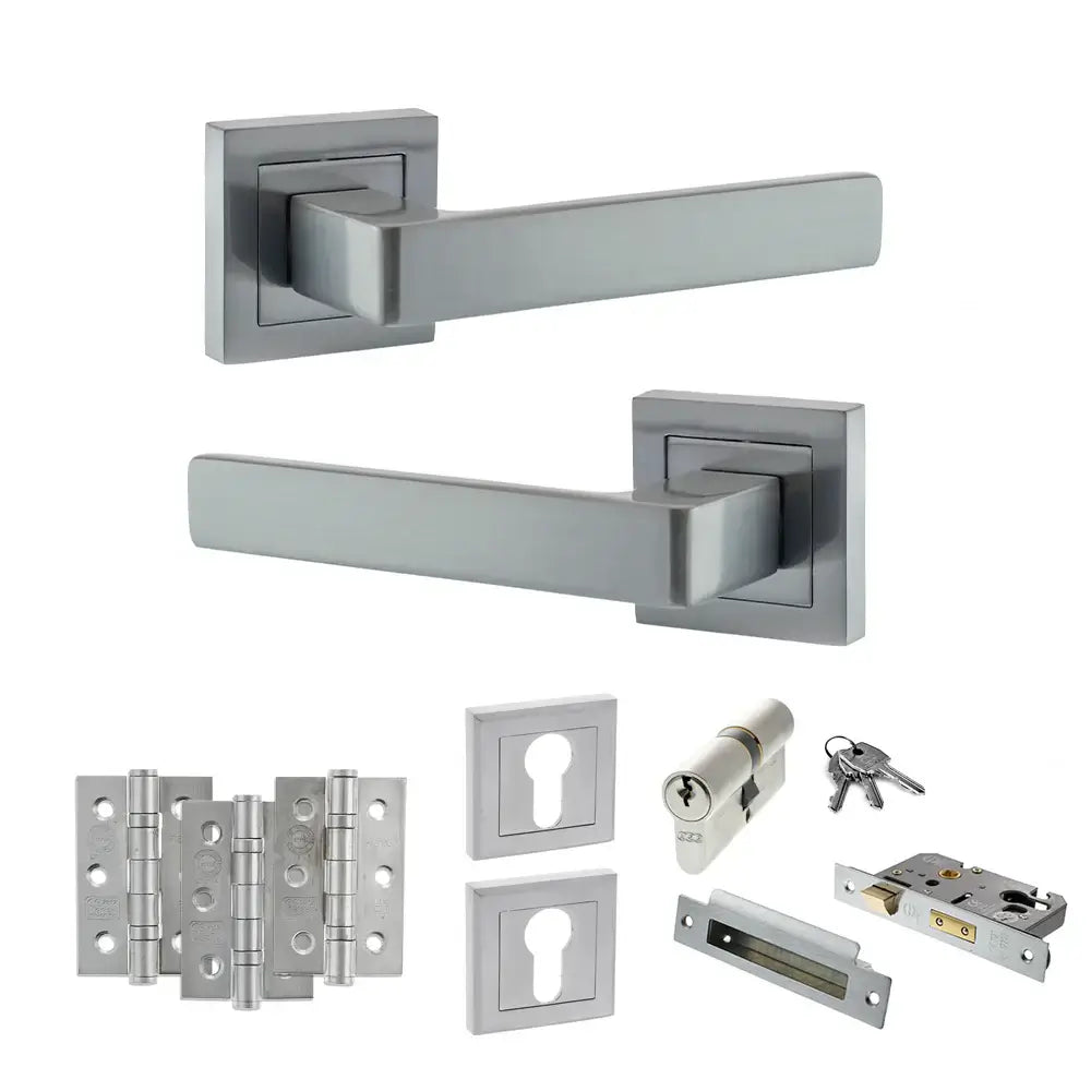 Product Set of stainless steel door handles and lock components on a white background