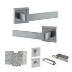 Product Set of stainless steel door handles and lock components on a white background
