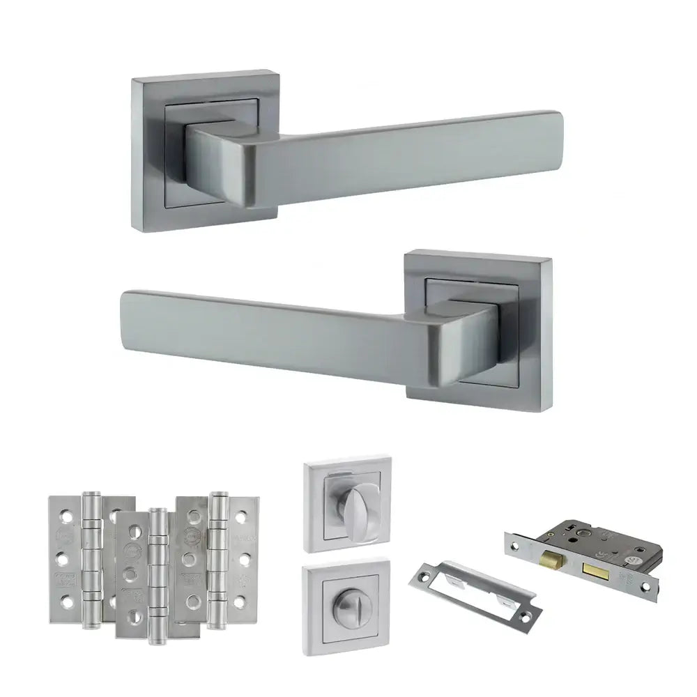 Product Set of stainless steel door handles and lock components on a white background