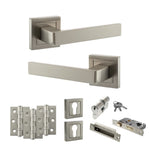 Product Set of metallic door handles, locks, and hinges on a white background