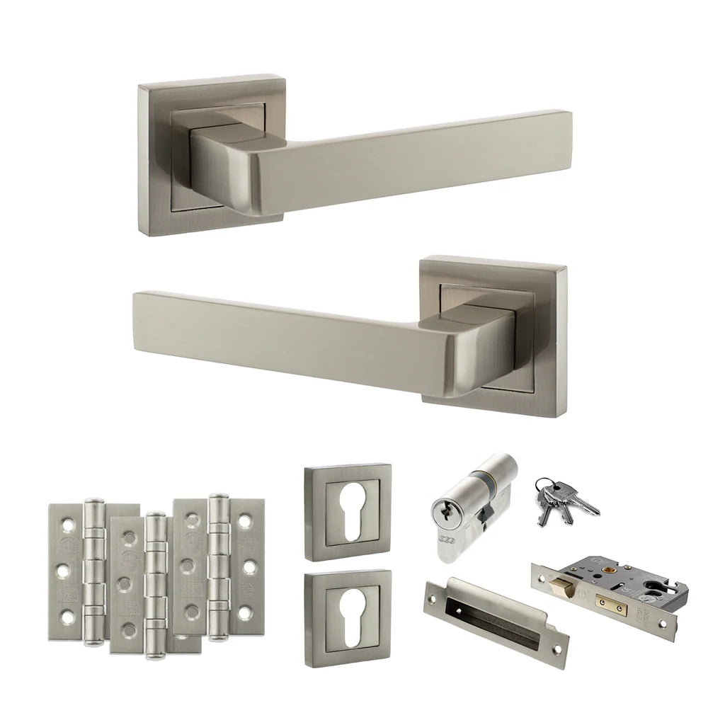 Product Set of metallic door handles, locks, and hinges on a white background