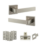 Product Set of metallic door handles and hardware components on a white background