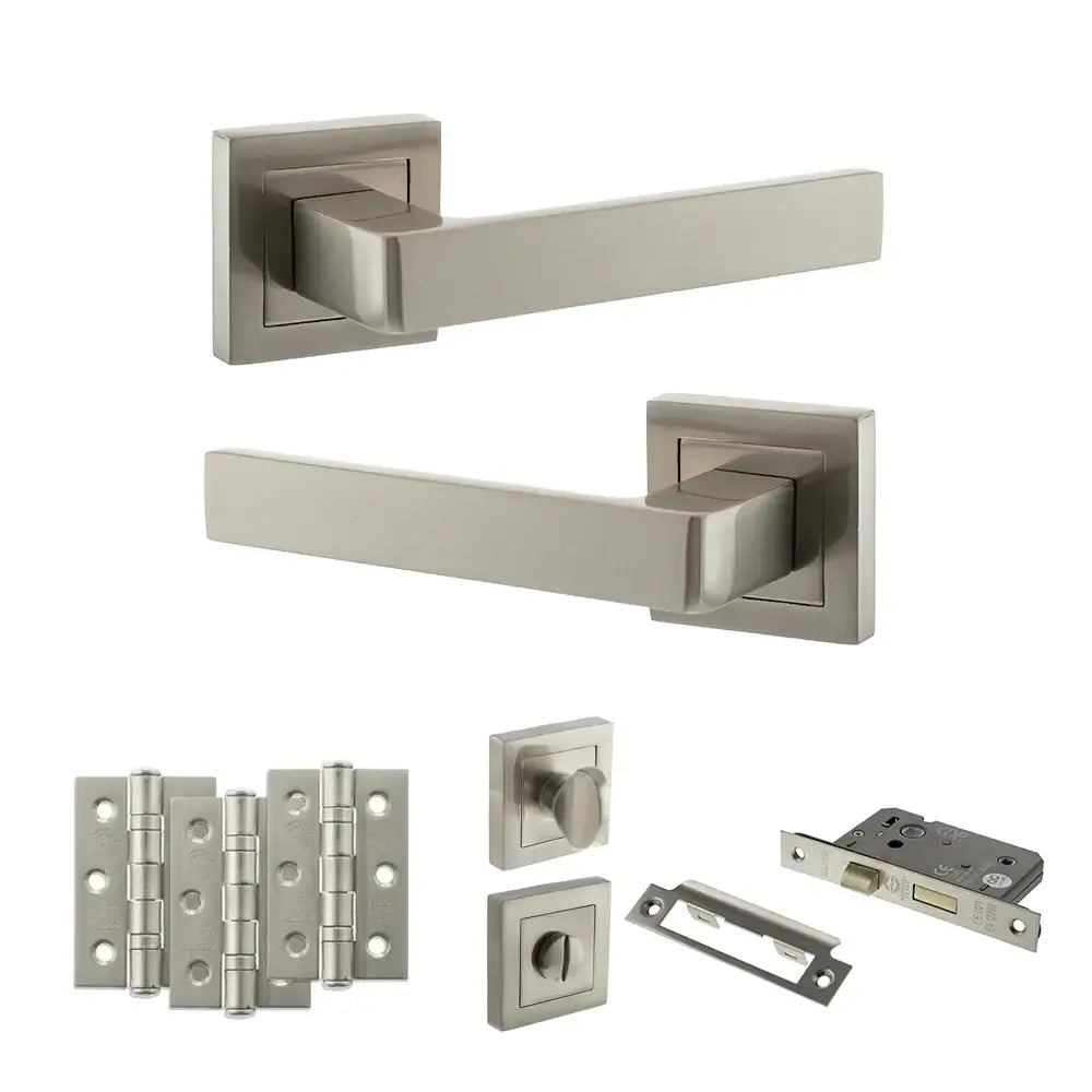 Product Set of metallic door handles and hardware components on a white background