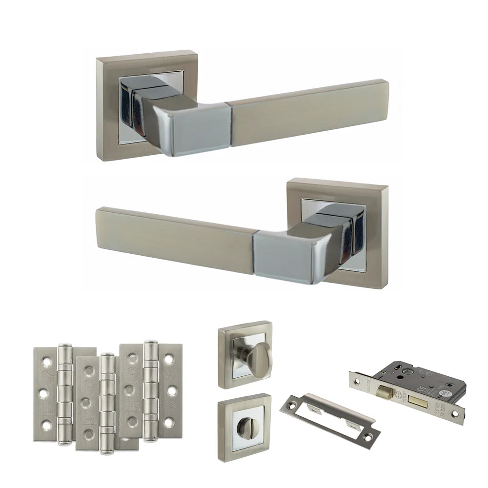 Product Set of metallic door handles and hardware on a white background