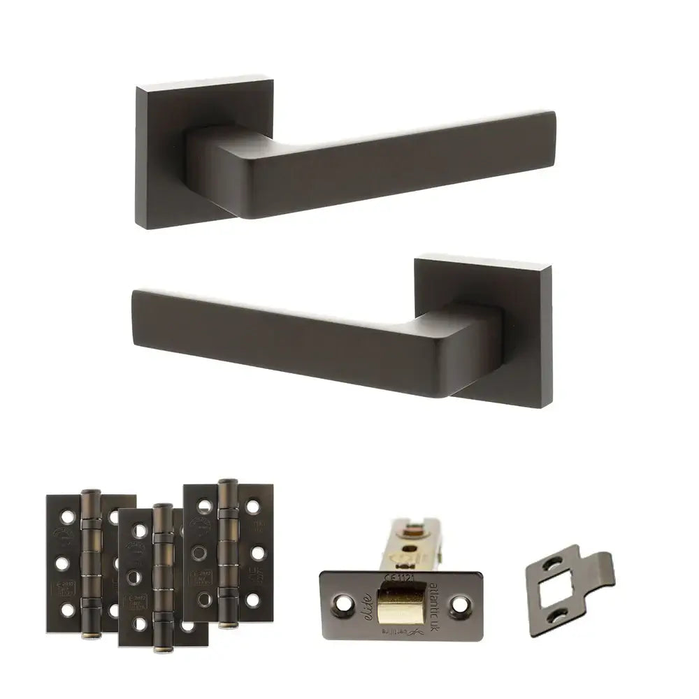 Product Set of black door handles and hardware components on a white background