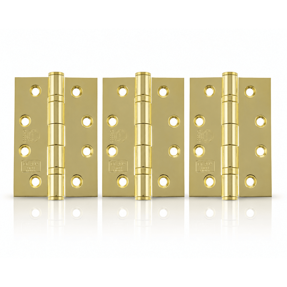 Product Three brass hinges arranged side by side on a clean white background with a subtle reflection underneath.