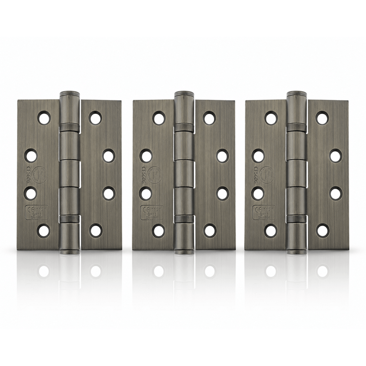 Product Three pairs of heavy-duty metal hinges in a brushed gunmetal finish, arranged side-by-side on a reflective white surface.