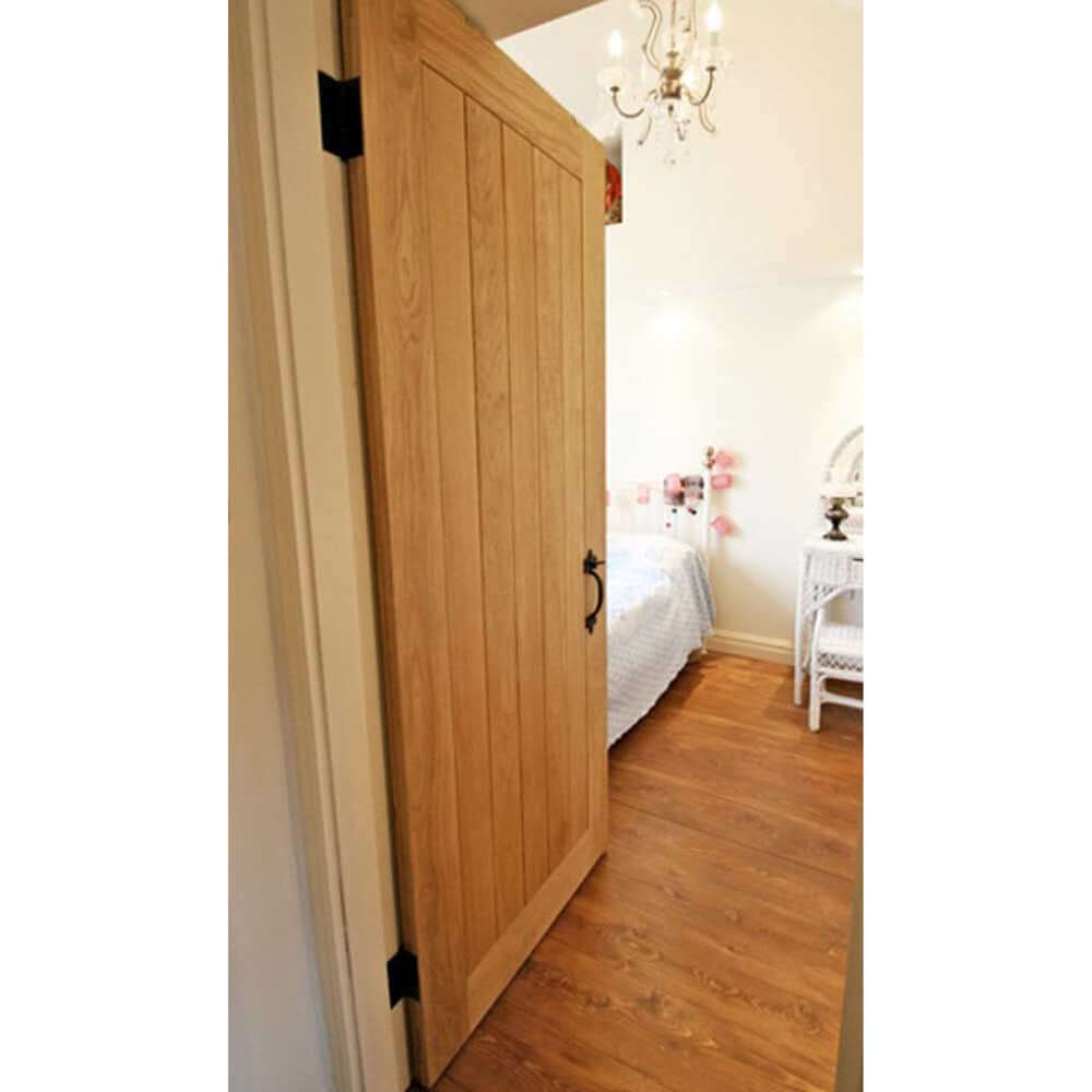 Lifestyle bespoke solid oak Suffolk door in room