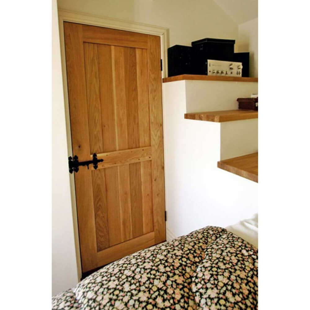 Lifestyle bespoke solid oak Suffolk door in room