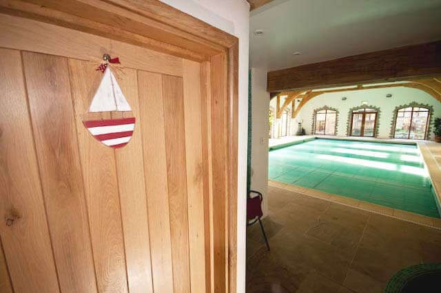 Lifestyle bespoke solid oak Suffolk door in room