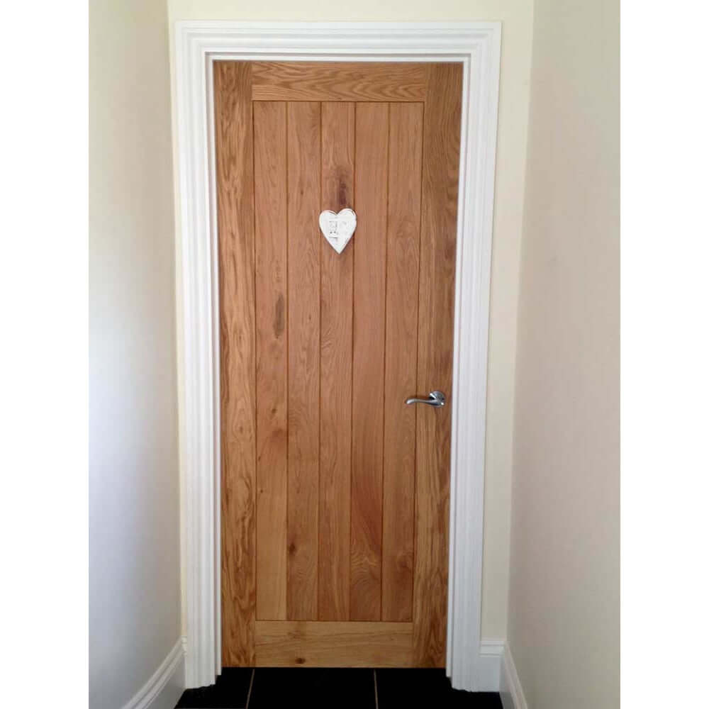 Lifestyle bespoke solid oak Suffolk door in room