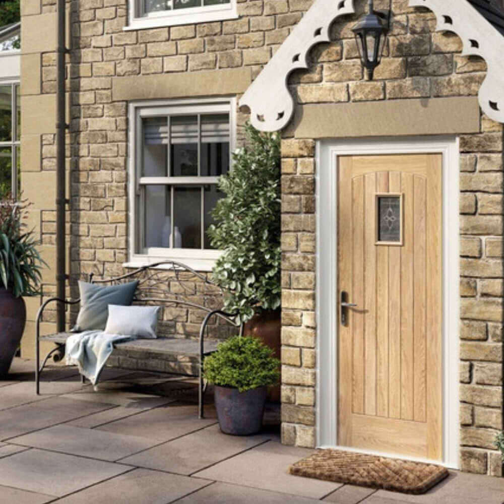 Lifestyle cottage oak glazed external door installed in a room setting