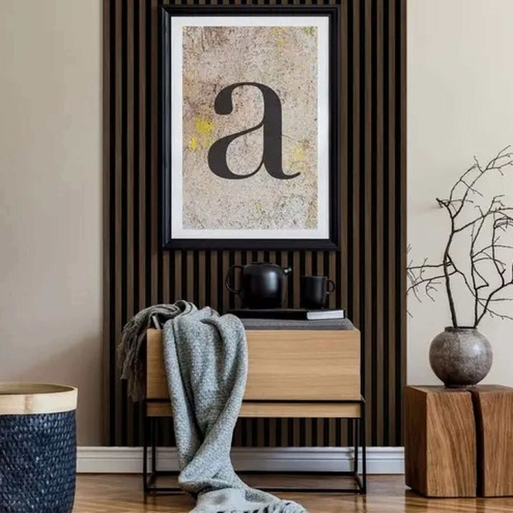 Lifestyle walnut laminate acoustic wall panel in styled hallway