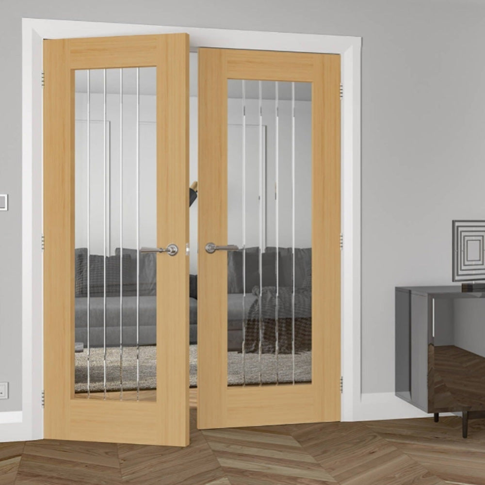 Pair of wooden doors with glass panels in a room setting.