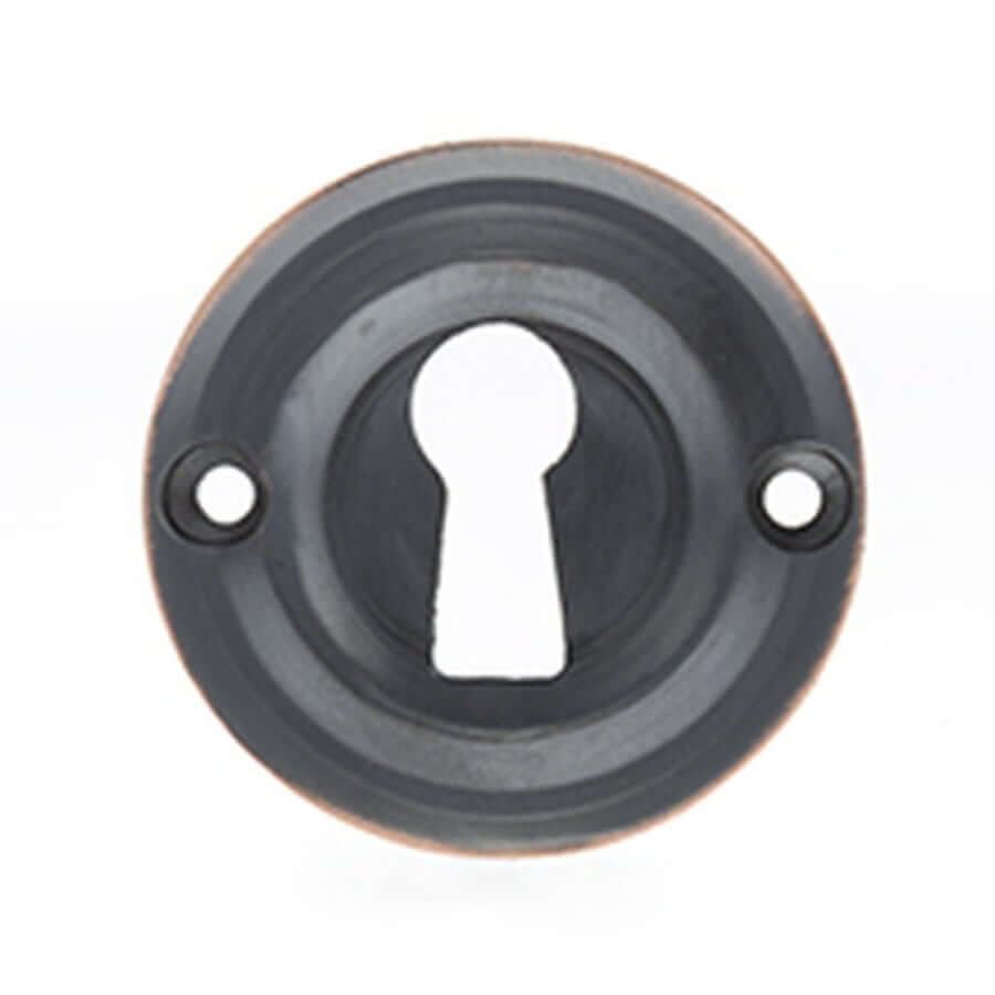 Product Old English black key escutcheon with copper edge
