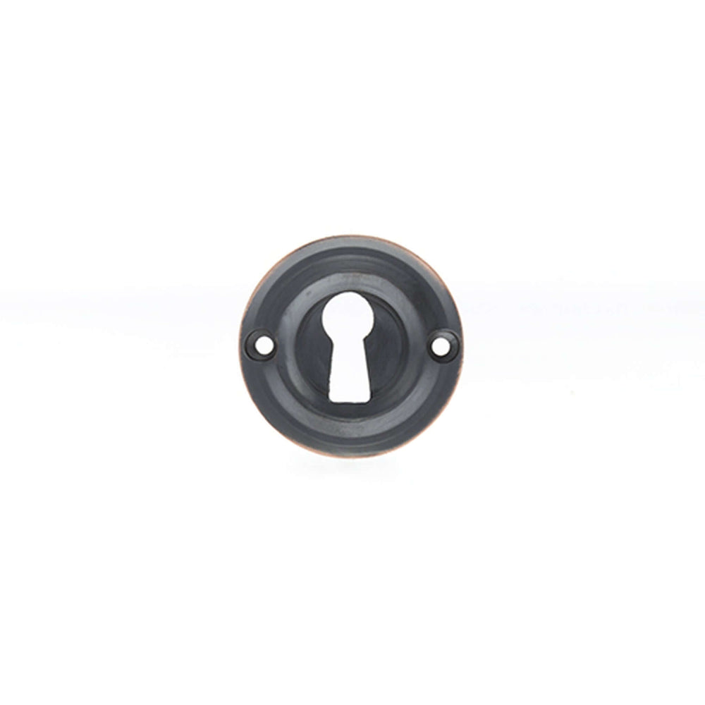 Product Old English black key escutcheon with copper edge