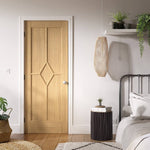 Reims 5 Panel Diamond Prefinished Oak Fire Door Lifestyle Image