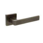 Product Bronze door handle on a white background