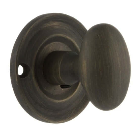 Product solid brass oval WC turn and release hardware close-up