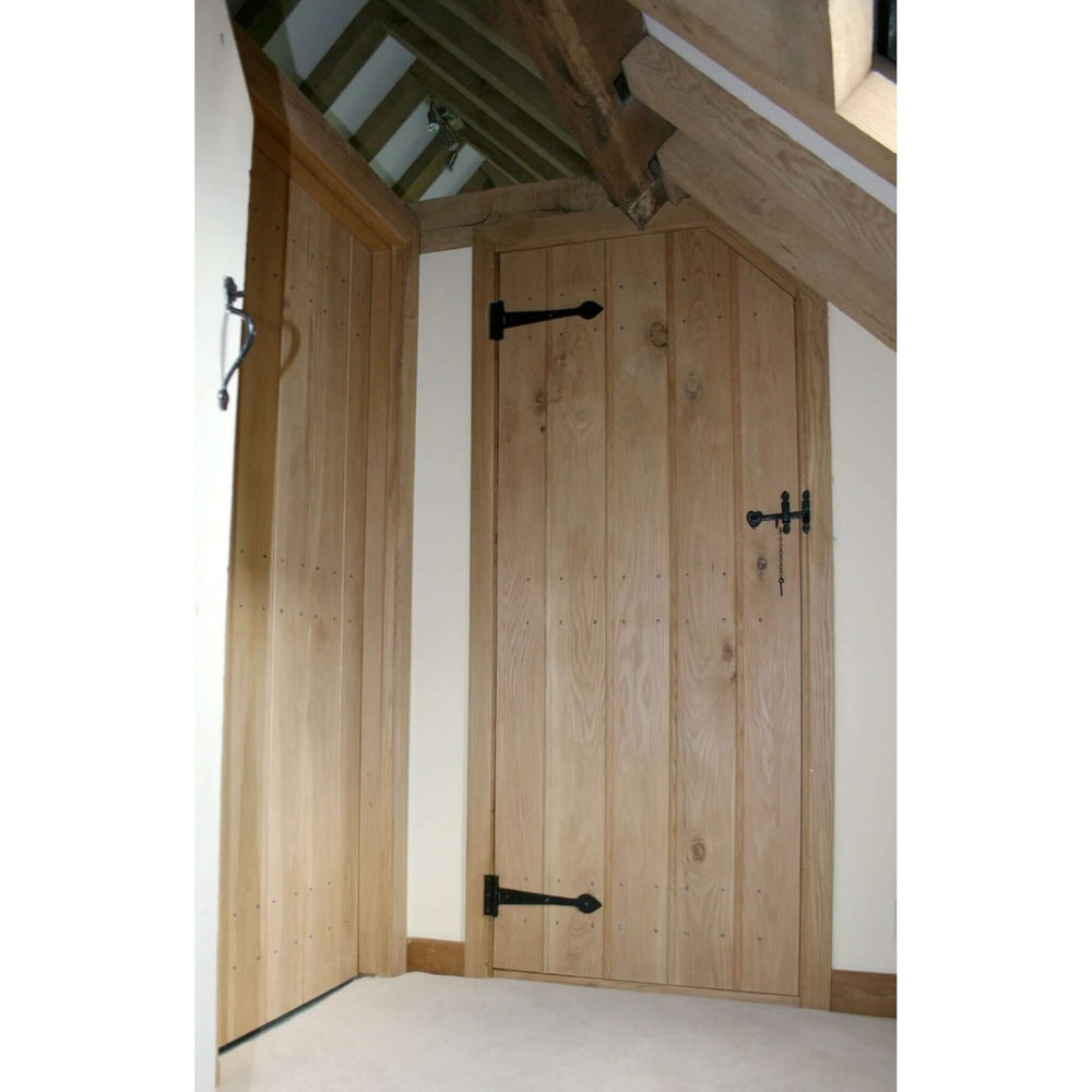 Lifestyle solid oak ledge and braced rustic V-groove door fitted in an interior