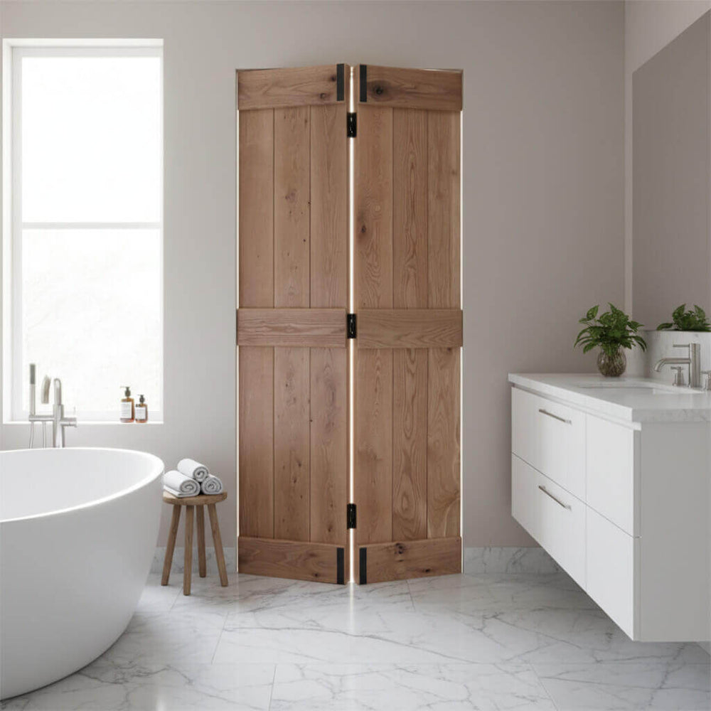 Lifestyle solid oak rustic bifold three-ledge V-groove cottage door installed in a home