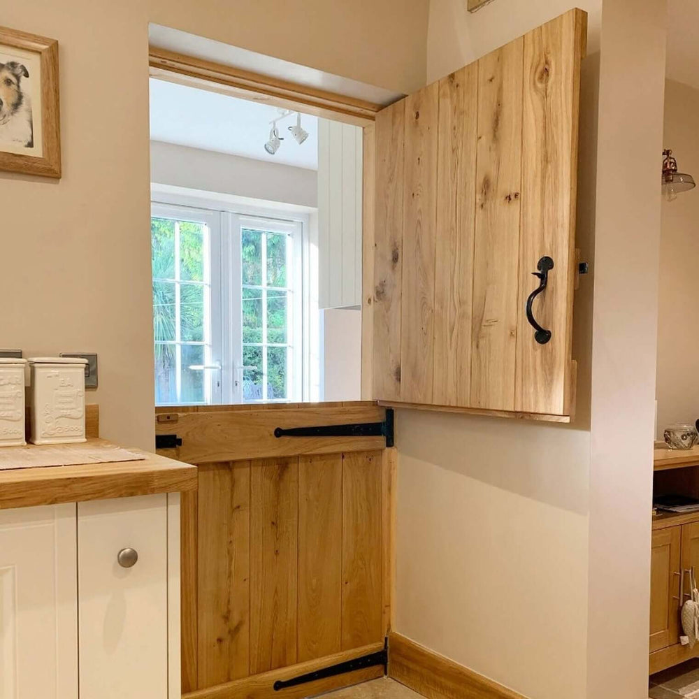 Lifestyle solid oak rustic V-groove profile stable door installed in a room setting