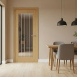Suffolk prefinished oak glazed door shown in a traditional cottage-style room
