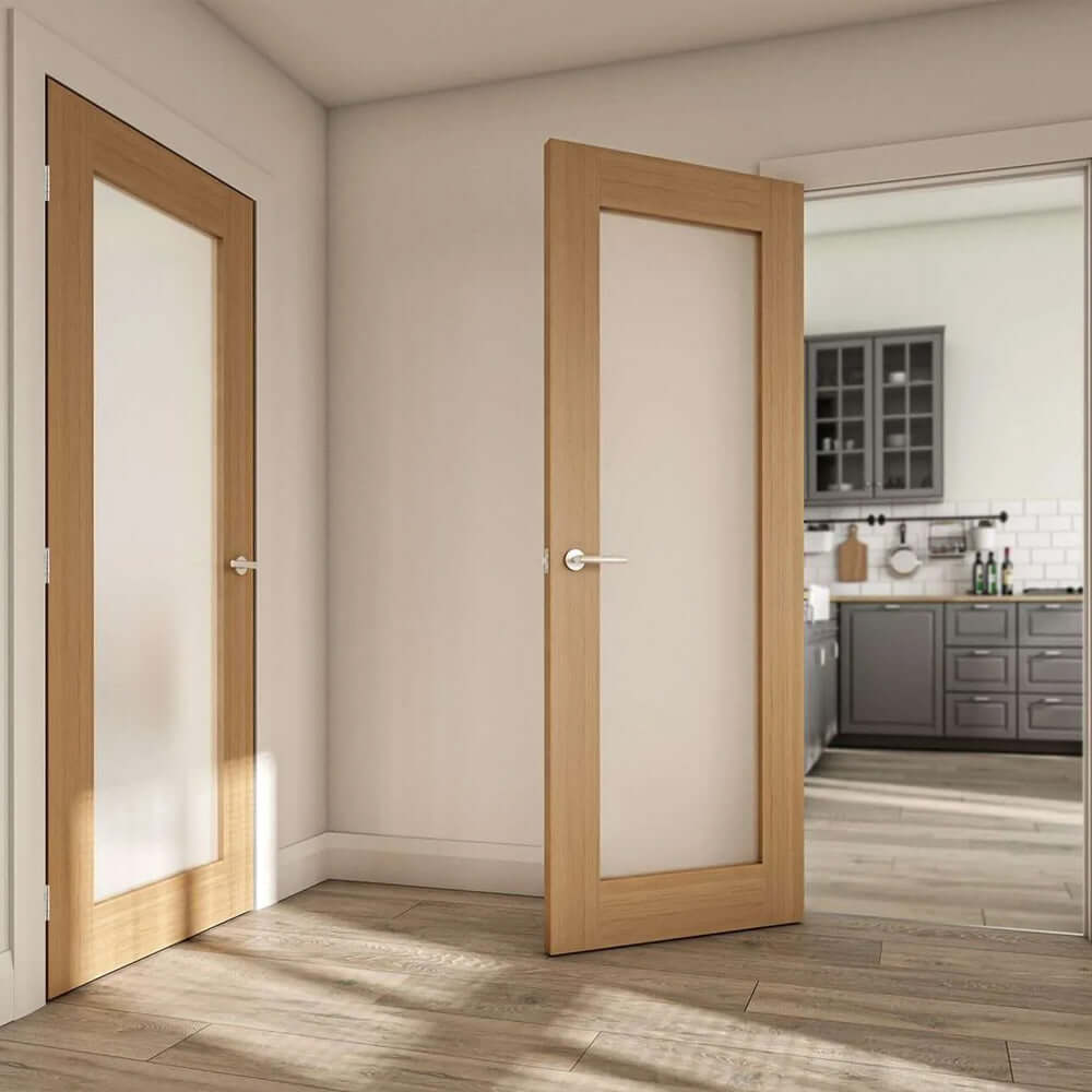 Lifestyle Walden obscure glazed panel oak door installed in a hallway